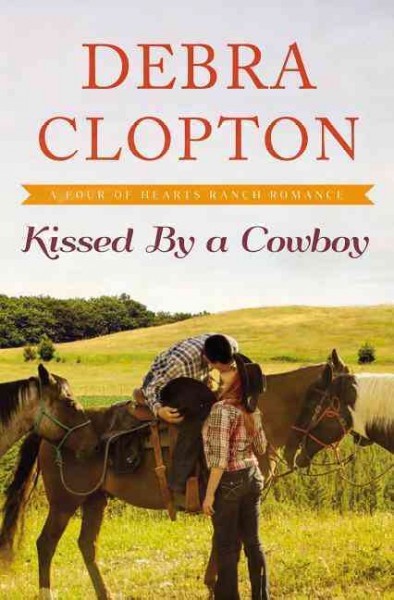 Kissed by a cowboy / Debra Clopton.