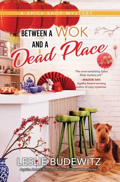 Between a wok and a dead place / by Leslie Budewitz.